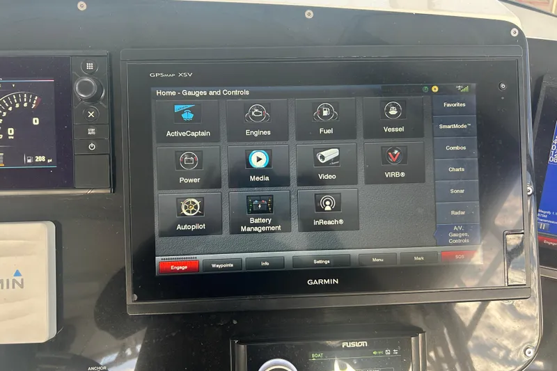  Yacht Photos Pics Garmin GPS display on 2007 Fountain 38 Sportfish Cruiser OB dashboard, showing navigation controls.