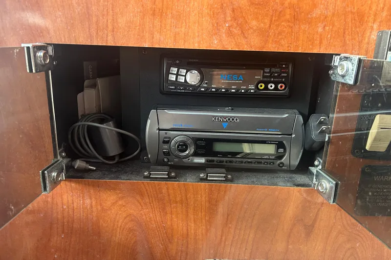  Yacht Photos Pics Audio system in a 2007 Fountain 38 Sportfish Cruiser OB boat cabinet.