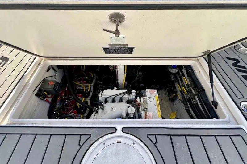  Yacht Photos Pics Engine compartment of a 2007 Fountain 38 Sportfish Cruiser OB boat, showing mechanical components.