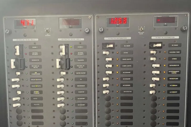  Yacht Photos Pics Electrical control panel of a 2007 Fountain 38 Sportfish Cruiser OB boat.