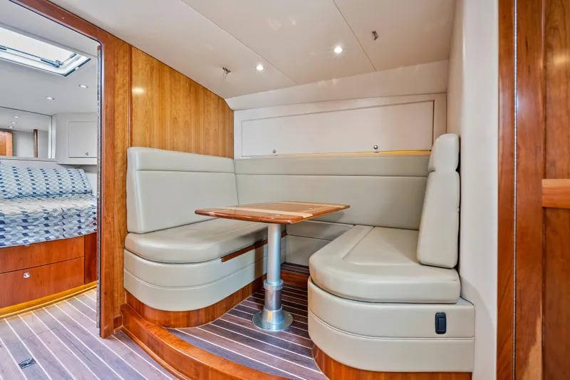 Salt Lick Yacht Photos Pics Luxurious interior of 2018 Albemarle 41 Express yacht with cozy seating and wooden accents.