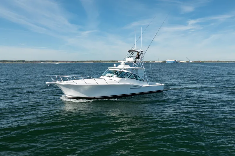 Salt Lick Yacht Photos Pics 2018 Albemarle 41 Express boat cruising on open water under clear skies.