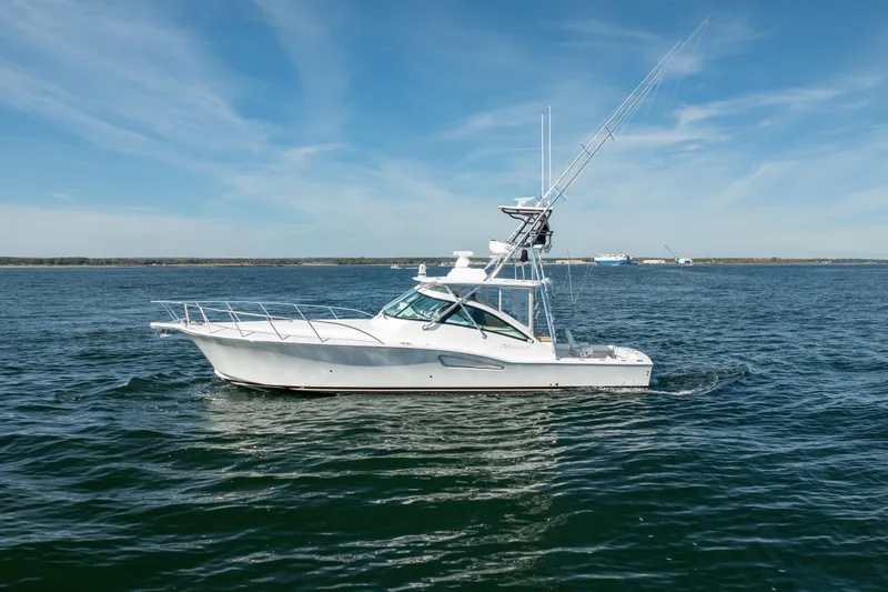 Salt Lick Yacht Photos Pics 2018 Albemarle 41 Express boat cruising on open water under a clear blue sky.