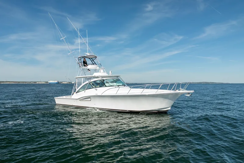 Salt Lick Yacht Photos Pics 2018 Albemarle 41 Express boat cruising on open water under clear blue sky.