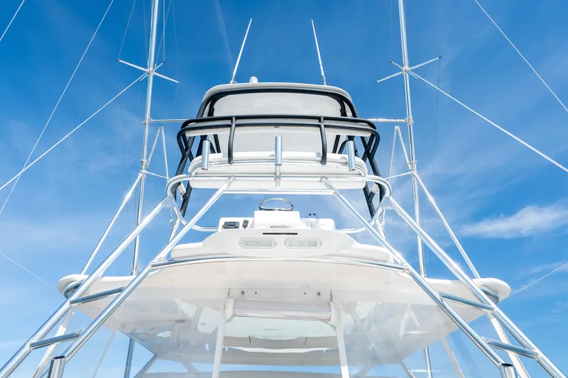 Salt Lick Yacht Photos Pics 2018 Albemarle 41 Express yacht tower against a clear blue sky.