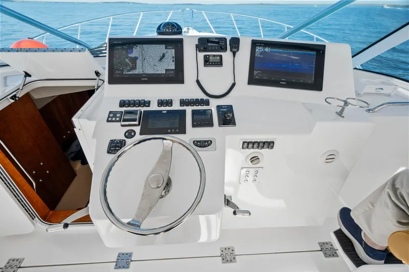 Salt Lick Yacht Photos Pics 2018 Albemarle 41 Express helm with advanced navigation displays and controls.