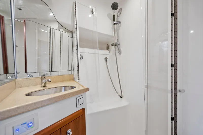 Salt Lick Yacht Photos Pics Luxurious bathroom in 2018 Albemarle 41 Express yacht with modern shower and sink.