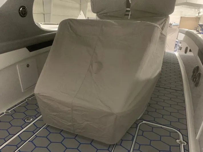  Yacht Photos Pics Covered seating area on 2020 Mystic Powerboats M4200 with hexagonal floor design.