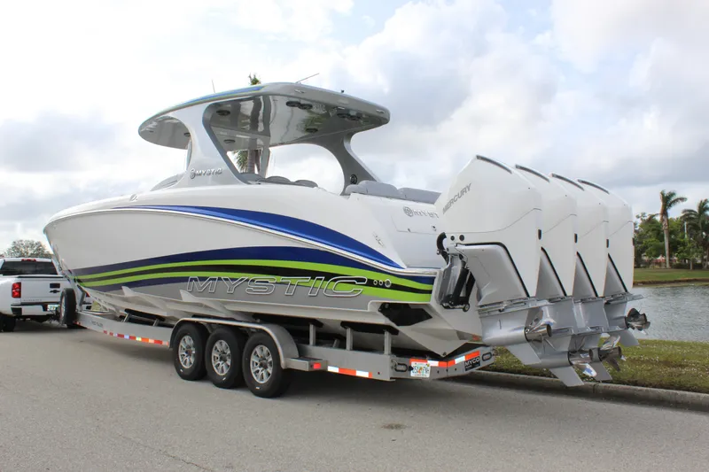  Yacht Photos Pics 2020 Mystic Powerboats M4200 on trailer with triple outboard engines.