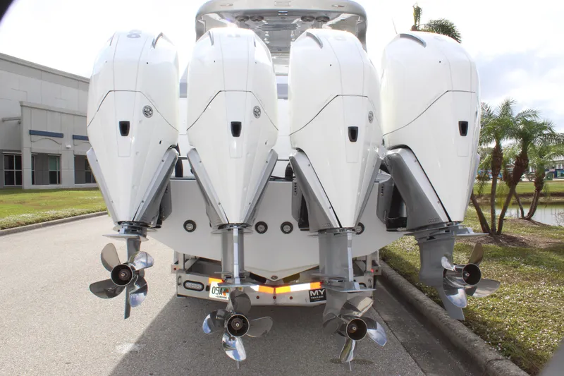  Yacht Photos Pics 2020 Mystic Powerboats M4200 with four powerful outboard engines, rear view.