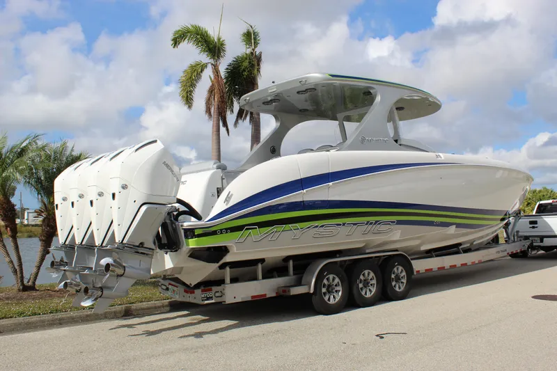  Yacht Photos Pics 2020 Mystic Powerboats M4200 on trailer, featuring sleek design and powerful engines.