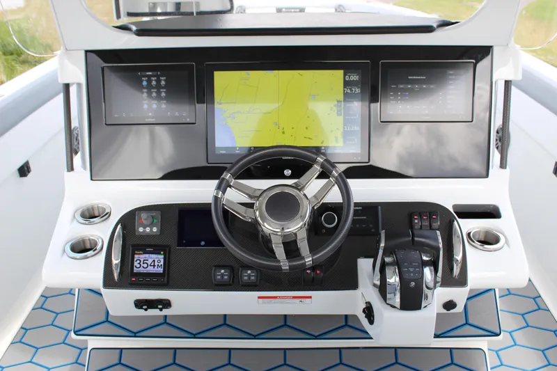  Yacht Photos Pics 2020 Mystic Powerboats M4200 dashboard with advanced navigation and control systems.