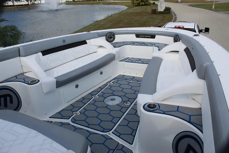 Yacht Photos Pics 2020 Mystic Powerboats M4200 interior with sleek seating and modern design.