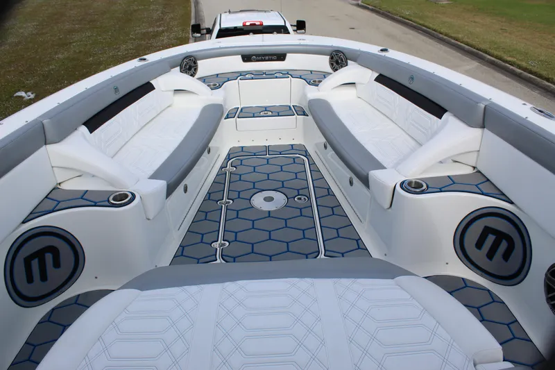  Yacht Photos Pics 2020 Mystic Powerboats M4200 interior with modern seating and stylish design.