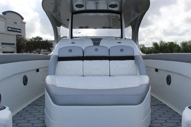  Yacht Photos Pics 2020 Mystic Powerboats M4200 interior with luxurious seating and modern design.