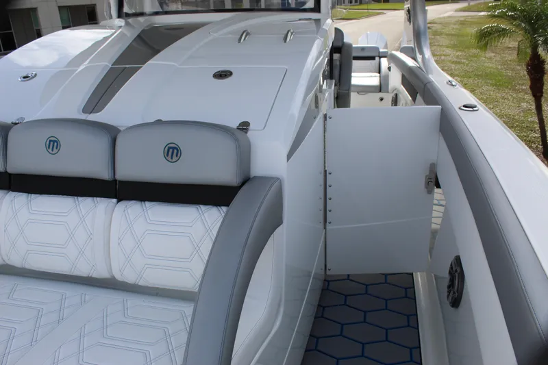  Yacht Photos Pics 2020 Mystic Powerboats M4200 interior with sleek seating and modern design.