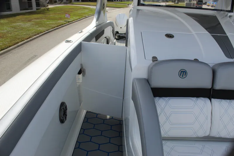  Yacht Photos Pics 2020 Mystic Powerboats M4200 interior with sleek seating and modern design.