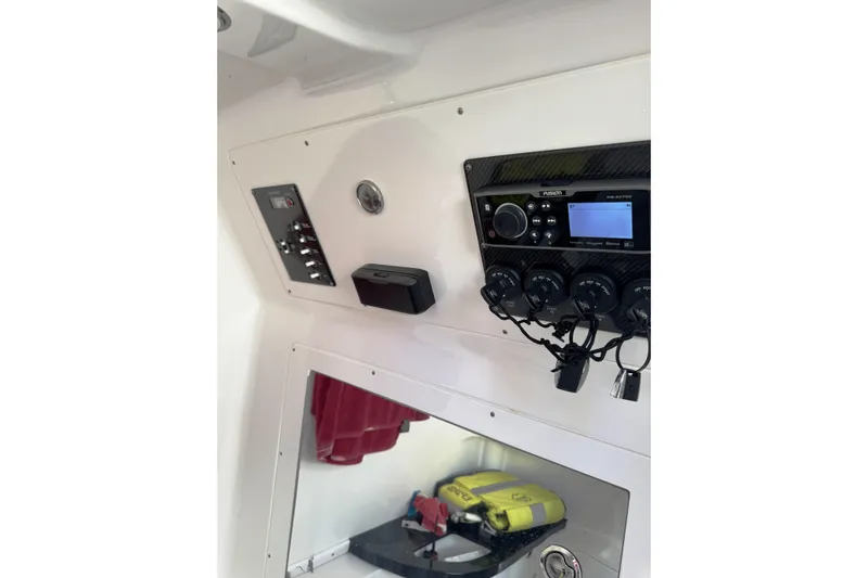  Yacht Photos Pics 2017 Cigarette 39' GTS boat dashboard with control panel and stereo system.