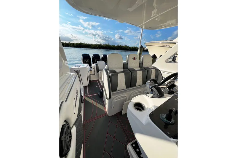  Yacht Photos Pics 2017 Cigarette 39' GTS boat interior with luxury seating and scenic water view.