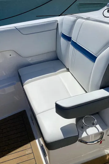 Knot Sorry Yacht Photos Pics 2021 Tiara Yachts 38LX boat seating with white and blue upholstery.