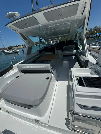  Yacht Photos Pics 2024 Beneteau Gran Turismo 36 yacht interior with spacious seating and modern amenities.