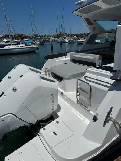  Yacht Photos Pics 2024 Beneteau Gran Turismo 36 yacht with Mercury engine, docked in a marina.