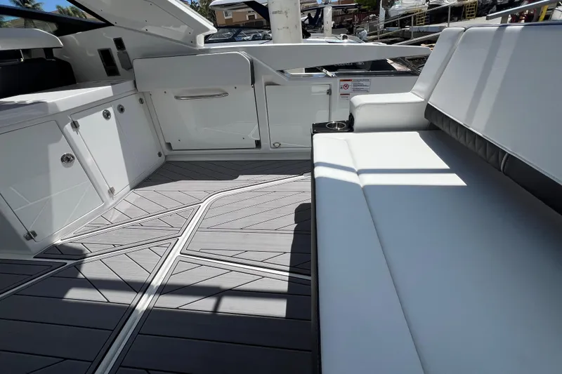  Yacht Photos Pics 2023 Monterey 385 Super Sport interior with sleek seating and modern design.