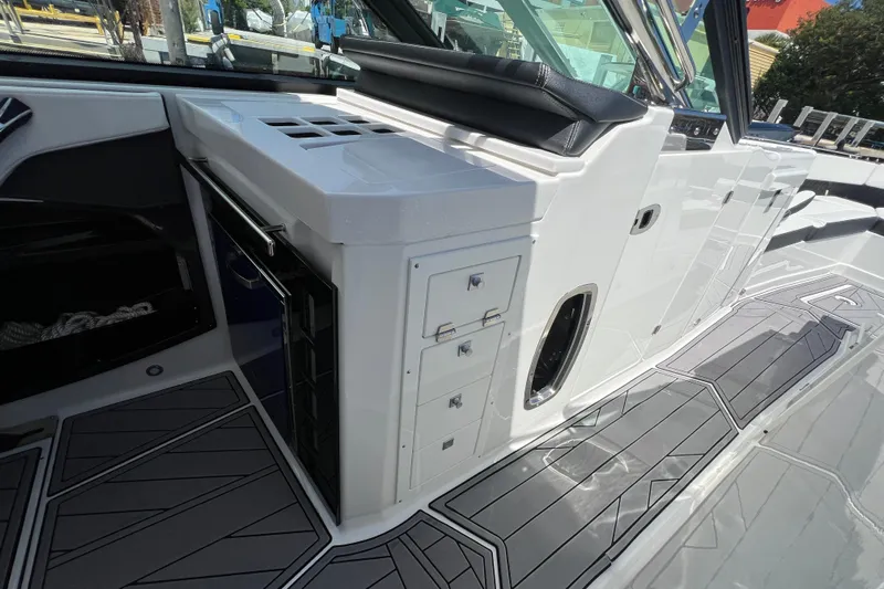  Yacht Photos Pics 2023 Monterey 385 Super Sport boat interior with sleek cabinetry and modern design.