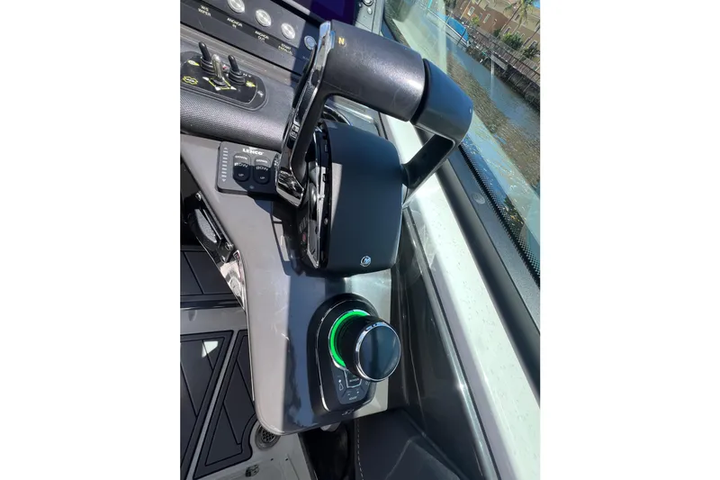  Yacht Photos Pics Control panel of 2023 Monterey 385 Super Sport boat with throttle and joystick.