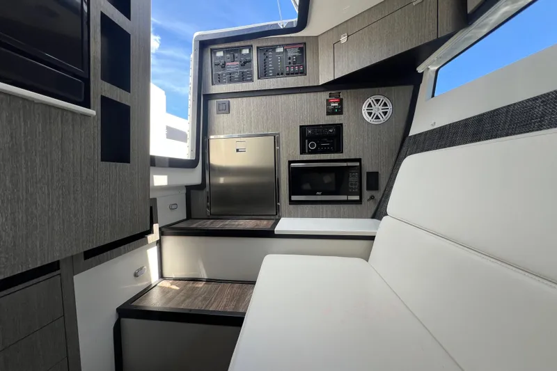 Yacht Photos Pics Interior of 2023 Monterey 385 Super Sport boat with modern amenities and sleek design.