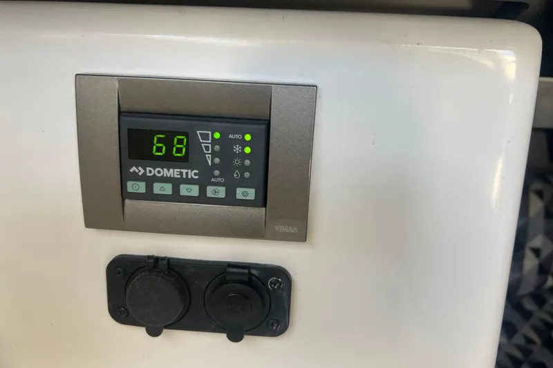  Yacht Photos Pics Dometic control panel in 2023 Monterey 385 Super Sport boat interior.