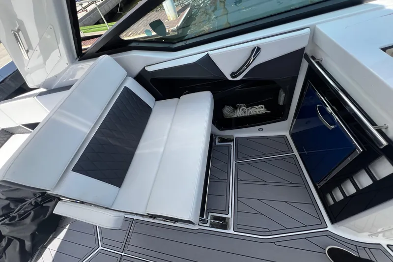  Yacht Photos Pics 2023 Monterey 385 Super Sport interior with sleek seating and modern design.