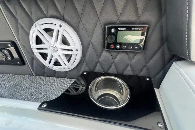  Yacht Photos Pics 2023 Monterey 385 Super Sport interior with speaker, control panel, and cup holder.