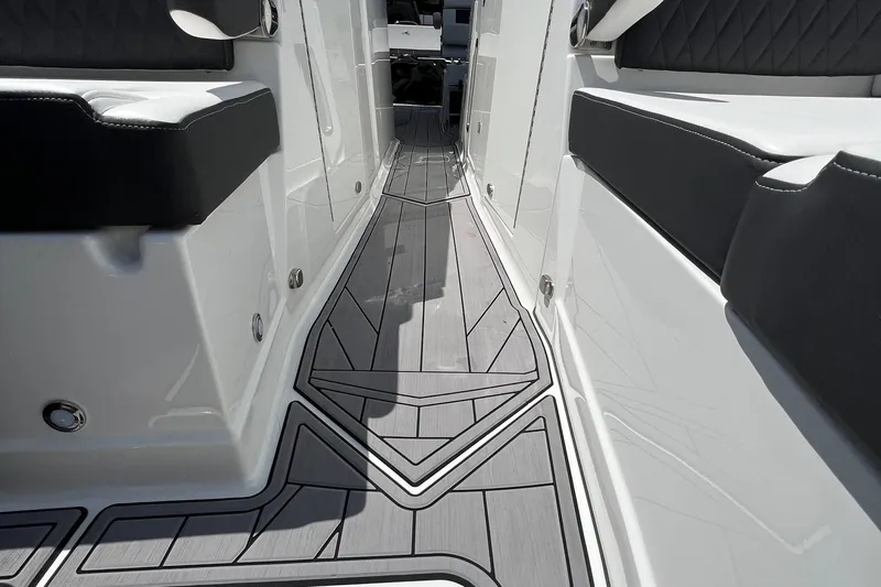  Yacht Photos Pics 2023 Monterey 385 Super Sport boat interior with sleek seating and modern flooring design.