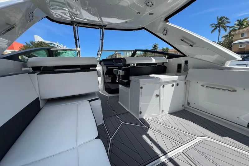  Yacht Photos Pics 2023 Monterey 385 Super Sport boat interior with sleek seating and modern design.