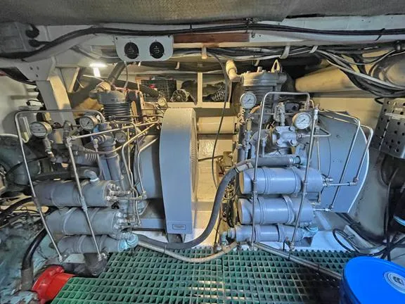 Truth Yacht Photos Pics Engine room of a 1974 Custom Expedition Liveaboard, showcasing machinery and equipment.