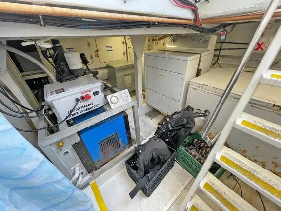 Truth Yacht Photos Pics Interior of 1974 Custom Expedition Liveaboard with equipment and storage area.