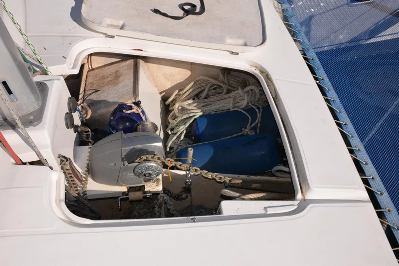Dreamweaver Yacht Photos Pics Open hatch of 2004 Fountaine Pajot Belize 43 catamaran showing anchor and ropes.