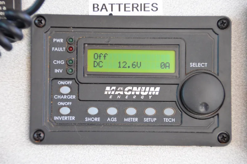 Dreamweaver Yacht Photos Pics Magnum Energy control panel displaying DC 12.6V on a 2004 Fountaine Pajot Belize 43.