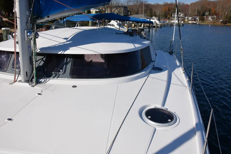 Dreamweaver Yacht Photos Pics 2004 Fountaine Pajot Belize 43 catamaran docked on a sunny day.