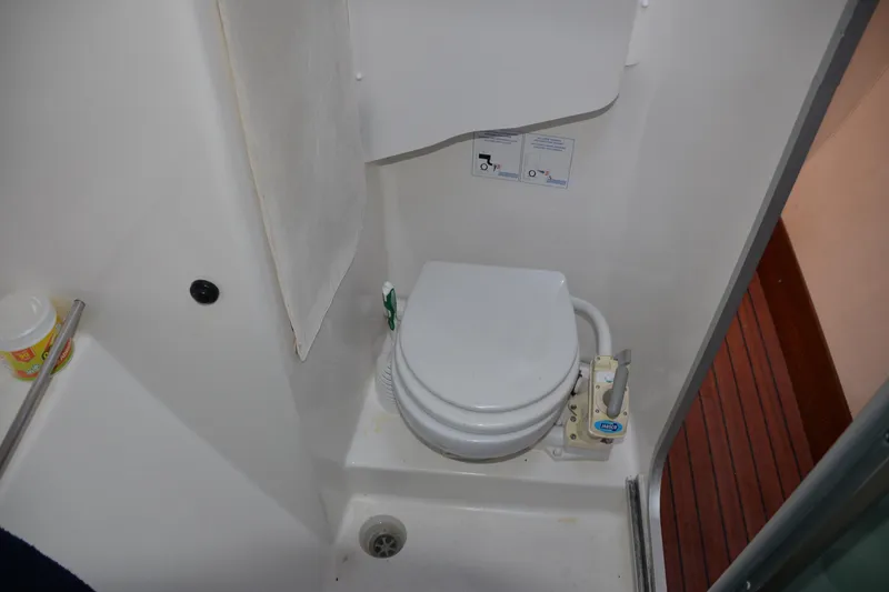 Dreamweaver Yacht Photos Pics 2004 Fountaine Pajot Belize 43 yacht bathroom with compact marine toilet.