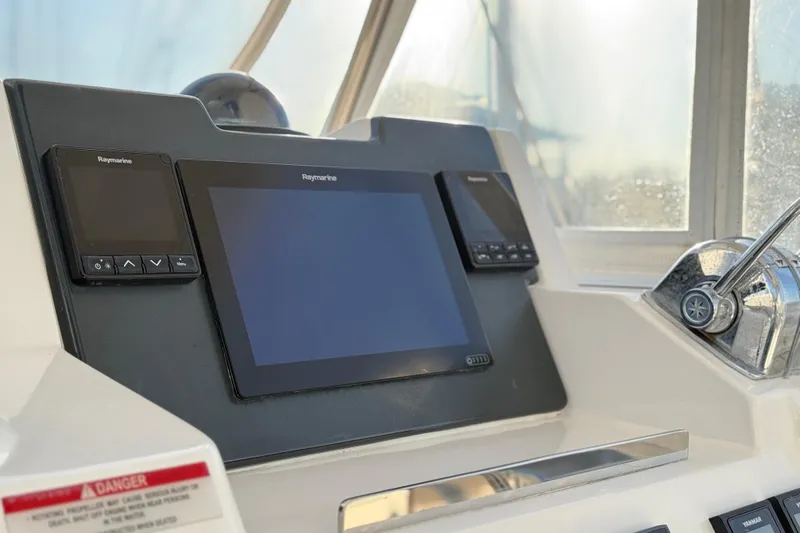 Panthera Yacht Photos Pics Control panel of a 2021 Leopard 42 yacht with Raymarine displays.