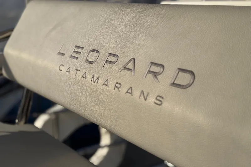 Panthera Yacht Photos Pics Leopard Catamarans logo on 2021 Leopard 42 yacht seat.