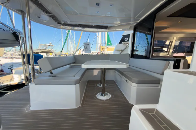 Panthera Yacht Photos Pics Leopard 42 yacht 2021 model with spacious outdoor seating and table.