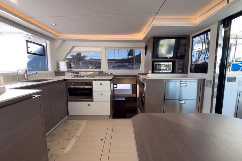 Panthera Yacht Photos Pics Modern kitchen interior of 2021 Leopard 42 yacht with sleek appliances and ample counter space.