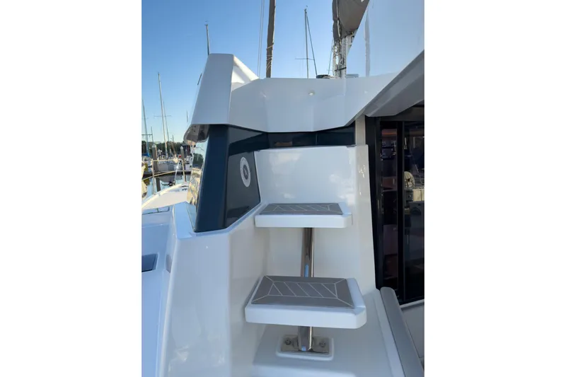 Panthera Yacht Photos Pics Modern 2021 Leopard 42 yacht with sleek exterior steps and marina backdrop.