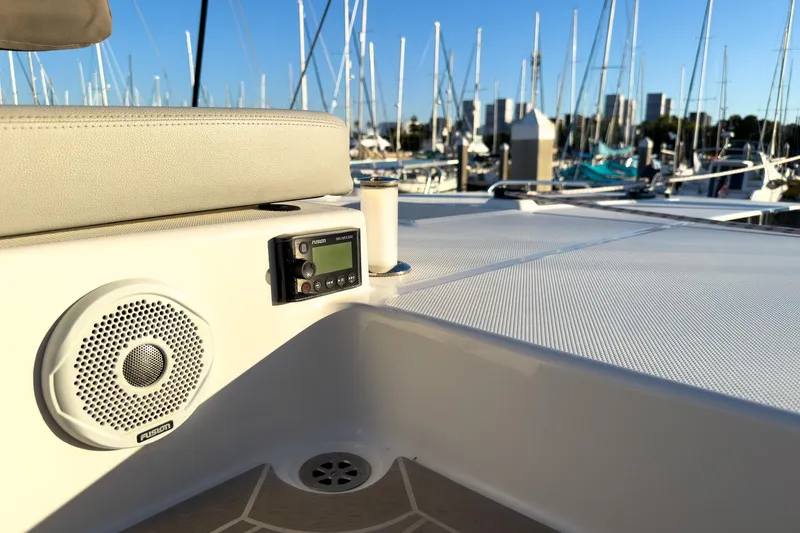 Panthera Yacht Photos Pics Leopard 42 yacht deck with speaker and control panel, marina background, 2021 model.
