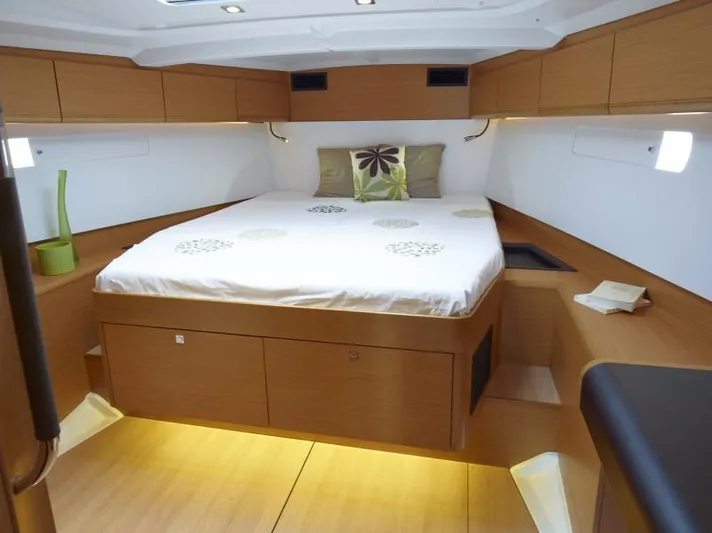 Fortuna Yacht Photos Pics Manufacturer Provided Image: Luxurious cabin interior of 2016 Jeanneau Sun Odyssey 519 sailboat with modern wood finish.