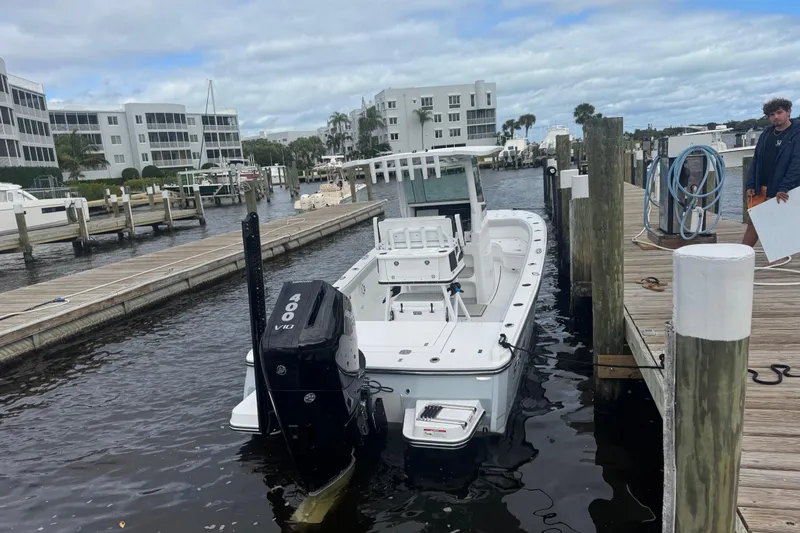 Your Next Boat! Yacht Photos Pics 2026 Blackfin 262 HB boat docked at marina with 400 V10 engine.