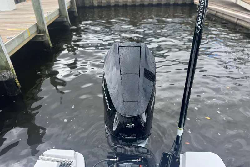 Your Next Boat! Yacht Photos Pics 2026 Blackfin 262 HB boat engine at dockside, featuring a sleek design.